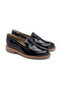 Navy patent leather loafers with a decorative front strap, cushioned insole, and a tan rubber sole. Smooth finish and rounded toe design.