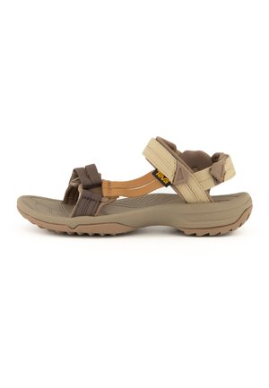 Beige og brun sandal med brede stropper, en struktureret sål og justerbare lukninger for en sikker pasform. Letvægtsdesign forbedrer komforten.
