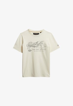 Cremefarvet T-shirt med kortærmer, rund hals og gråt Superdry Co. logo og tekst trykt på fronten.
