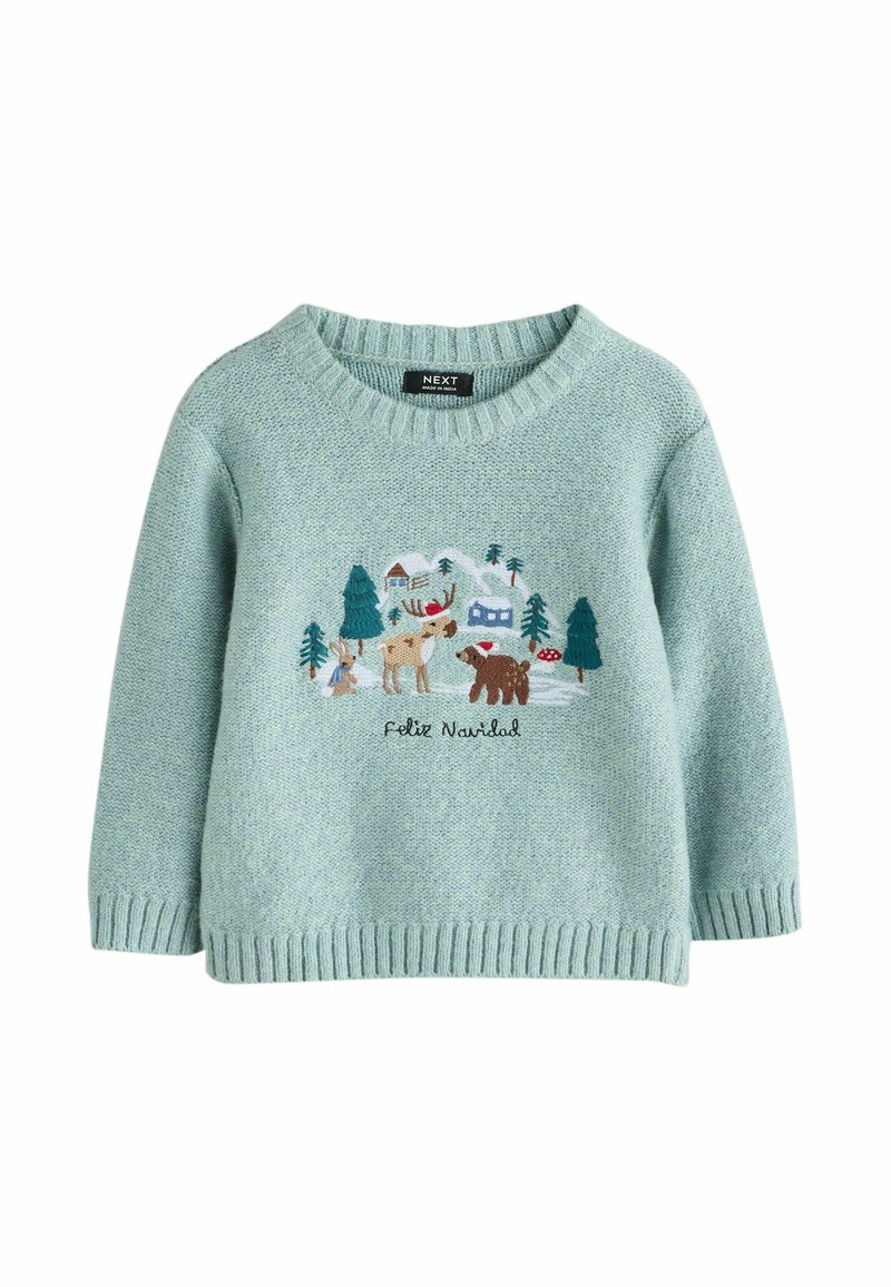 Pull vert clair avec un col rond et un ourlet côtelé. Présente une scène forestière colorée brodée avec des animaux et le texte "Feliz Navidad."