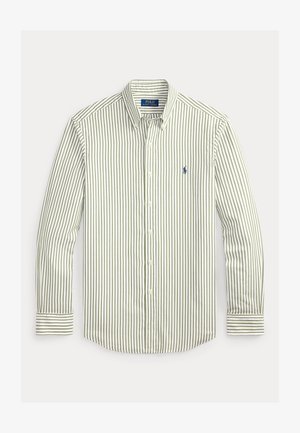 Πουκάμισο με ρίγες σε ανοιχτό πράσινο και λευκό. Διαθέτει κλασικό γιακά, μακριά μανίκια και μικρό ναυτικό λογότυπο στο στήθος.