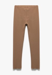 Brune teksturerede leggings med en tætsiddende pasform, der har en flad talje og sømløs konstruktion. Stoffet ser strækbart og holdbart ud.
