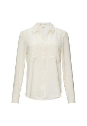 Cremfarbene Bluse mit langen Ärmeln, Kragen, zwei vorderen Taschen, Knopfverschluss und einem leicht strukturierten Stoff.