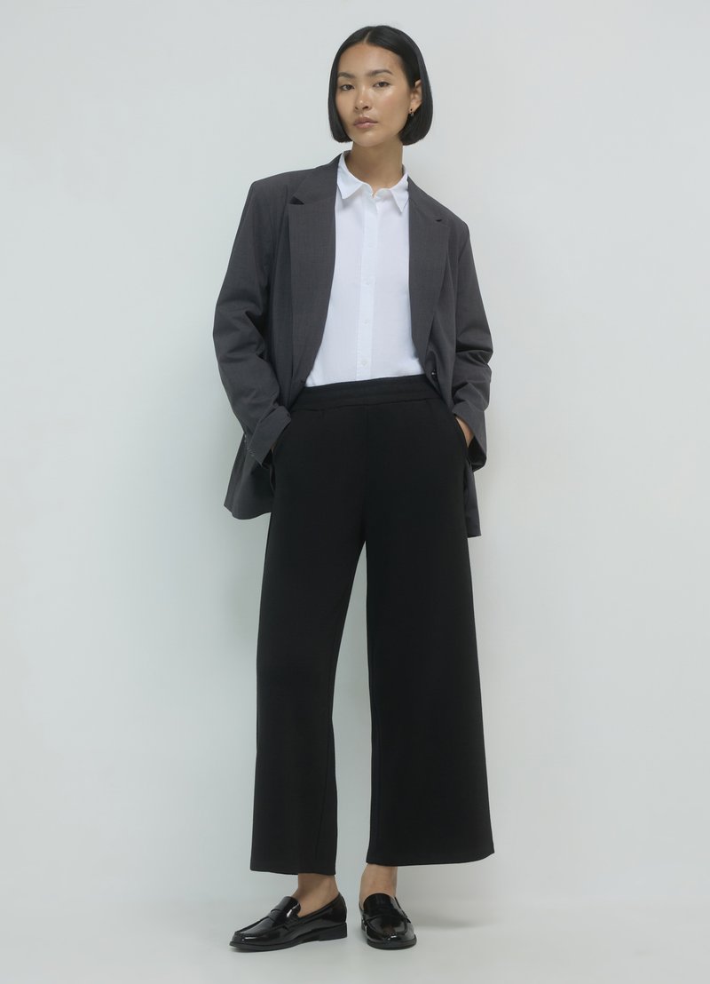 Calliope MILANO - Pantalon classique - nero ultrablack