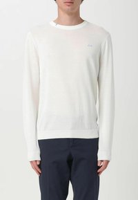 Maglione bianco a maniche lunghe con polsini e orlo a costine. Caratterizzato da un sottile logo blu sul petto e un collo rotondo. Tessuto leggero.