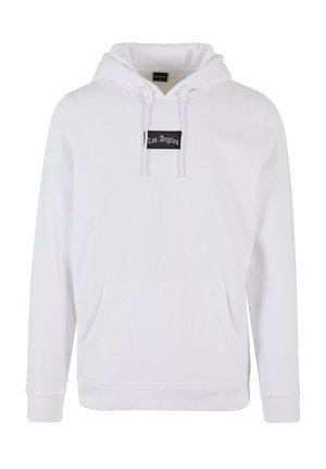 Vit hoodie i mjukt material med en känguruficka, dragsnoddar och en svart etikett med texten "Los Angeles" på framsidan.