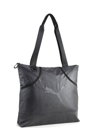 Bolsa tote negra de Puma con asas largas, cierre de cremallera y logo de Puma en el frente, hecha de tela texturizada.