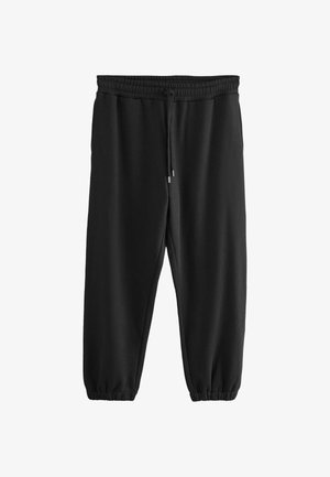 Černé tepláky vyrobené z měkké látky, s elastickým pasem s tkaničkou a elastickými manžetami na kotnících. Jednoduchý design.