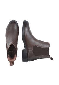 Brązowe skórzane botki za kostkę z elastycznymi bocznymi panelami, okrągłym noskiem, teksturowaną powierzchnią i niskim czarnym obcasem. Pętelka z tyłu ułatwiająca zakładanie.