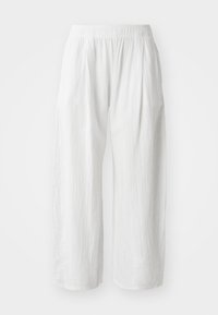 White, lightweight, wide-leg pants with a textured appearance and an elastic waistband for comfort. No visible pockets or fastenings.