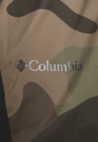 Camouflage fabric featuring shades of green, brown, and black with a silver "Columbia" logo. Textured, durable material.