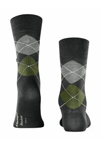 Skarpety argyle do kolan w ciemnoszarym kolorze, z zielonymi i jasnoszarymi wzorami w romby, z białymi akcentami i prążkowanymi mankietami. Materiały nieokreślone.