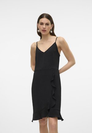 Schwarzes Kleid mit V-Ausschnitt, dünnen Trägern und einem rüschierten Saum. Hergestellt aus leichtem, strukturiertem Stoff, mit lockerer Passform und sanfter Drapierung.