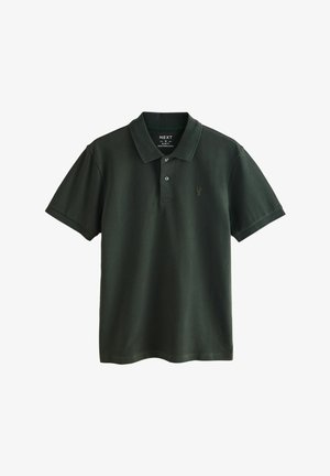 Dark green polo shirt made of textured cotton, featuring a two-button placket, short sleeves, and a small embroidered logo on the chest.