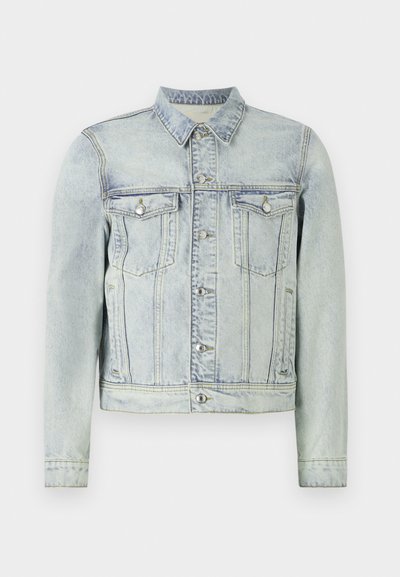 Light wash denim jacket featuring a button-front, two chest pockets, and a classic collar. Textured fabric with slight fading.