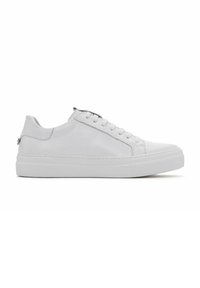 White leather sneakers with a smooth texture, round toe, and flat rubber sole. Features lace-up design and rear pull tab.