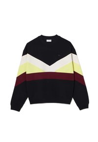 Sudadera negra con un patrón de chevron en crema, amarillo y rojo oscuro. Cuenta con cuello redondo y puños acanalados. Pequeño logo en el pecho.