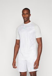 Nike Performance TOP - Camiseta deportiva - photon dust/dynamic turquoise