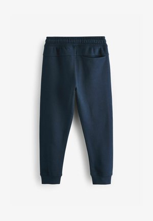 Pantaloni sportivi blu navy con vita e polsini elasticizzati, caratterizzati da una texture di tessuto liscia e una tasca posteriore singola.
