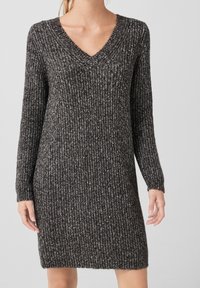 Knit dress with a V-neck and long sleeves, featuring a textured gray and black pattern, mid-thigh length, and loose fit.