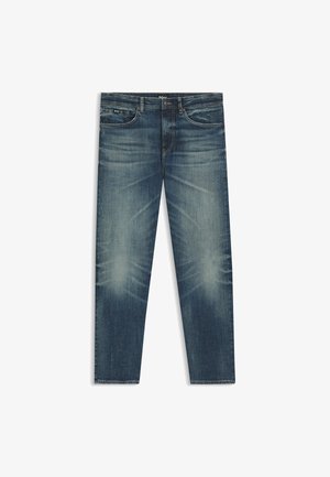 Jeans en denim bleu foncé avec une coupe droite. Dotés d'un effet délavé à l'avant, de deux poches avant et d'une étiquette de marque à l'intérieur de la taille.