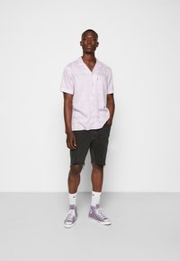Levi's® LOOSE - Calções de ganga - hard candy short