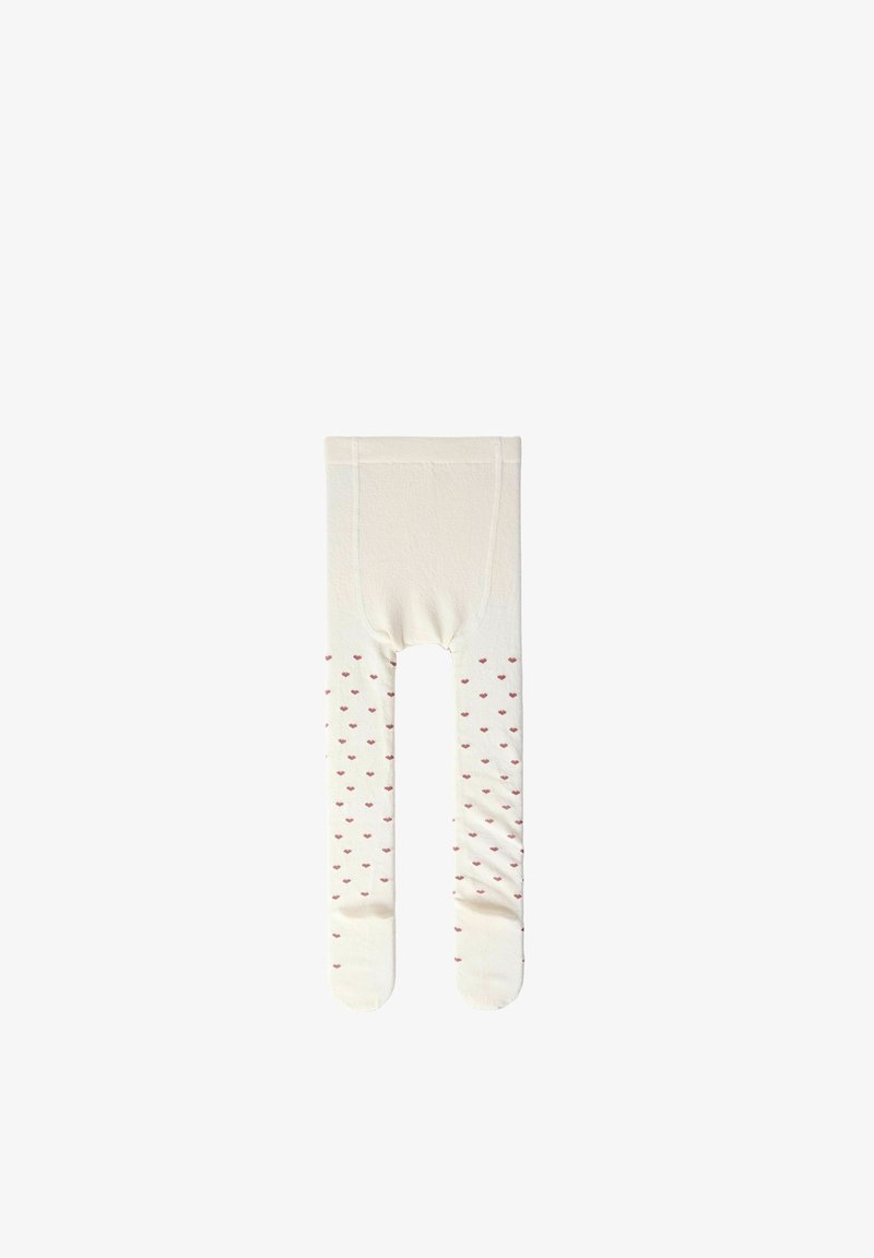 Collants pour bébé couleur crème avec petits motifs en forme de cœur rouges sur les jambes et une ceinture unie.