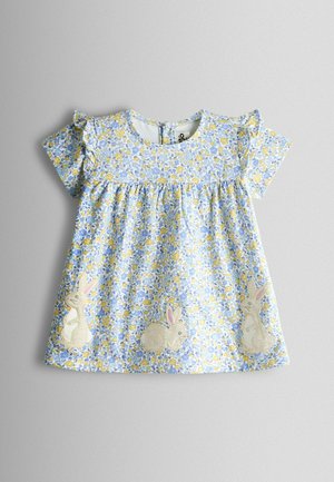 Helehall sinine kleit, millel on lillemuster kollaste ja siniste õitega. Lühikesed volangiga varrukad ja esiküljel jäneseaplikatsioonid.