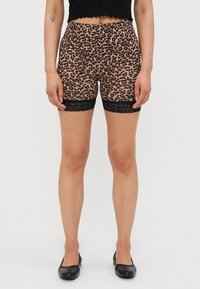Shorts i leopardmønster med en tettsittende stil, med en teksturert svart blondekant langs kanten og en elastisk midje.