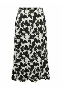 Zwart-witte midi rok met een koeienprint, gemaakt van lichte stof, met een vloeiende silhouette en een gegolfde rand.