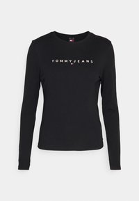 Musta pitkähihainen T-paita, joka on valmistettu puuvillasta. Tässä paidassa on pyöreä kaula-aukko ja edessä on valkoisella ja punaisella tekstillä "TOMMYJEANS".
