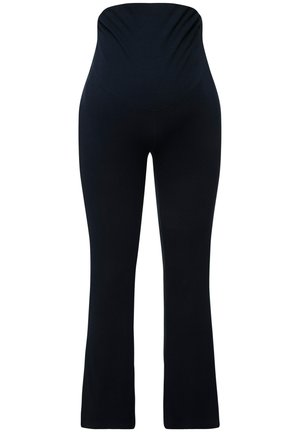 Pantalones negros de campana hechos de un material elástico, con una cintura ajustada y una textura suave. Presentan un diseño fruncido en la parte superior.