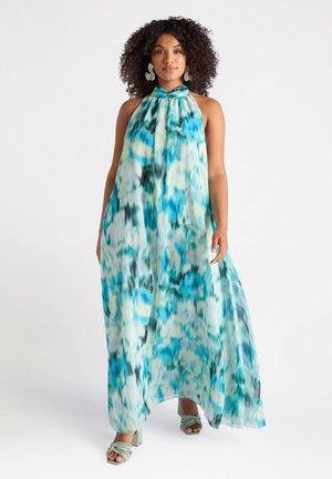Abito maxi in un tessuto leggero e fluido con un motivo astratto blu, verde e giallo. Collo a halter con una vestibilità ampia.