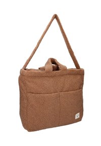 Bruine fleece tas met een groot hoofdcompartiment, twee voorvakjes en een verstelbare schouderriem. Getextureerd, zacht materiaal met ronde handvatten.