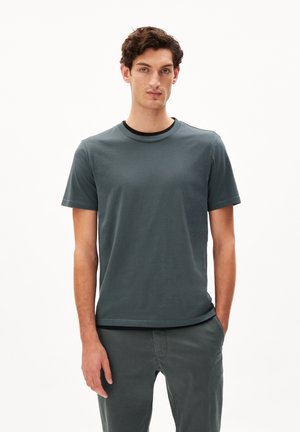 Dark grey short-sleeve t-shirt with a round neckline and a smooth texture, paired with matching trousers. Simple design, no visible patterns.