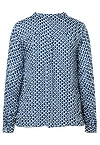 Langärmlige Bluse aus hellblauem Stoff mit einem Muster aus sich überlappenden dunkelblauen Ovale. Verfügt über einen geraden Schnitt und geknöpfte Manschetten.