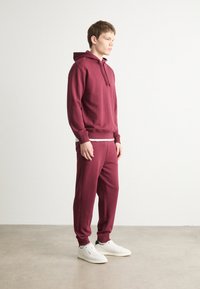 HUGO TRACKSUIT DAPODAYOTE SET - Treniņtērps - dark pink