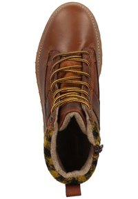 Brown leather boot with yellow laces, a wool interior, and a black-and-yellow patterned collar. Rounded toe and a textured sole.