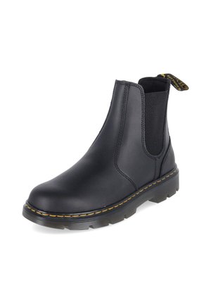 Schwarzer Chelsea-Lederstiefel mit elastischen Seitenteilen, gelber Naht an der Sohle und einem gebrandeten Zuglaschen hinten.