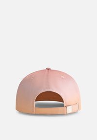 Cap with an orange to pink gradient, soft fabric, rounded crown, and adjustable strap. Features a logo on the strap's metal accent.