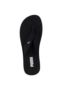 Infradito nere con suola in gomma, dotate di un lettino testurizzato, cinghie in tessuto e logo "PUMA" bianco centrato sul lettino.