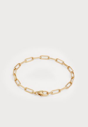Gold link bracelet featuring elongated oval links with a smooth finish, secured by a lobster clasp. Minimalist design with a sleek texture.