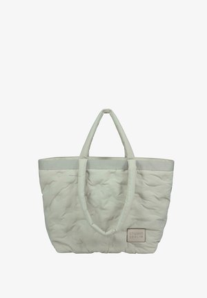 Quilted tote bag i lysegrå med solide håndtag, en tekstureret overflade og et rektangulært logo-mærke, der siger "STUDIO BERLIN."