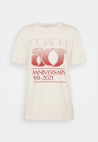 COACH T-shirt med print - light yellow