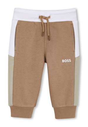 Pantalon de jogging marron avec ceinture blanche, panneaux latéraux beiges, poches avant, cordon de serrage et logo "BOSS" sur la cuisse droite.