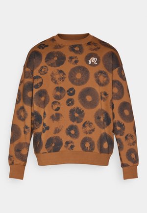 Felpa marrone con motivi floreali neri e polsini a costine. Presenta uno scollo rotondo e un piccolo logo bianco sul petto.