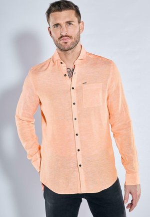 Helles orange Button-up Hemd mit langen Ärmeln, einer einzelnen Brusttasche und schwarzen Knöpfen. Strukturierter Stoff mit einem lässigen Schnitt.