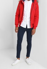 Tommy Jeans Giacca da mezza stagione - light red