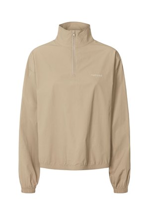 Veste beige à demi-fermeture éclair avec col haut, poignets élastiqués et coupe décontractée. Présente un logo discret sur le devant. Matière légère.