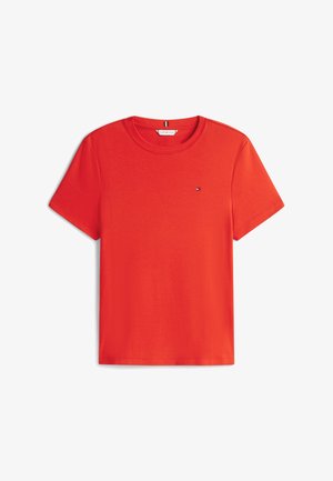 Red cotton t-shirt with a round neckline and short sleeves. Features a small logo on the chest. Smooth texture, casual fit.